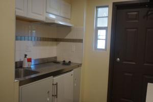 Kuchyň nebo kuchyňský kout v ubytování Tuscan Garden Inn