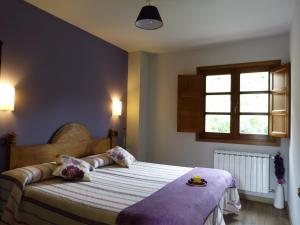 Postel nebo postele na pokoji v ubytování Apartamentos El Valledor