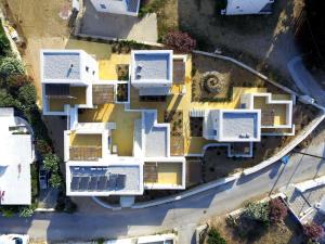 an aerial view of a house with white buildings at Nomads House in Logaras