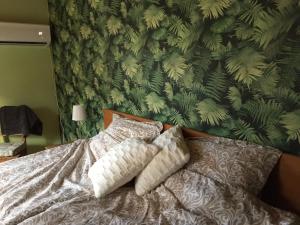 Ein Bett oder Betten in einem Zimmer der Unterkunft Sanddala Bed & Breakfast