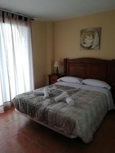 Postel nebo postele na pokoji v ubytování Sisos Place + 17 fotografií