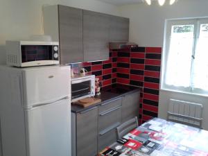 Dapur atau dapur kecil di Chalet aux 2 sapins