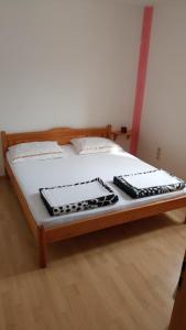 Postel nebo postele na pokoji v ubytování Apartments Ante
