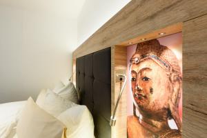 Postel nebo postele na pokoji v ubytování Wellness & Ayurveda Hotel Am Eichenberg