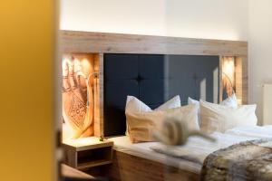 Postel nebo postele na pokoji v ubytování Wellness & Ayurveda Hotel Am Eichenberg