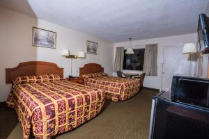 Postelja oz. postelje v sobi nastanitve Parkview Motel