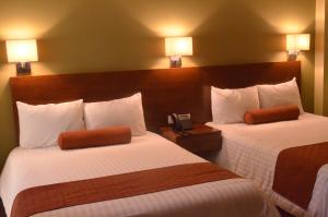 Postel nebo postele na pokoji v ubytování Hotel Posada del Virrey