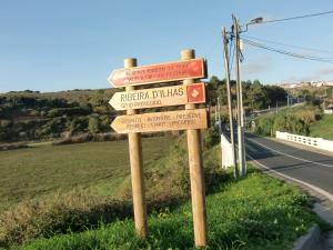 a street sign on the side of a road at The Surf Studio - Ericeira in Ericeira