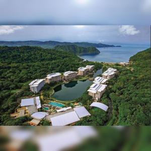 an aerial view of a resort in the middle of a lake at Miranda 504B 1BR at Pico de Loro by Raquel's Place in Nasugbu