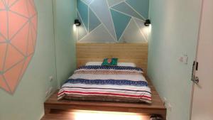 Postel nebo postele na pokoji v ubytování Star Moon Forest Inn