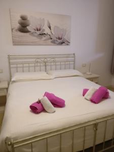 A bed or beds in a room at Agriturismo Nonna Bettina