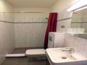 Koupelna v ubytování Hotel Fabrik Vösendorf