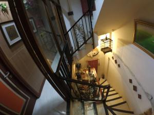 an overhead view of a staircase in a building at The Cabin Hotel Gandekan in Yogyakarta