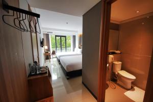 Koupelna v ubytování Hay Bandung + 37 fotografií