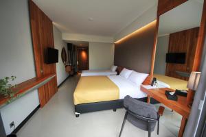 Tempat tidur dalam kamar di Hay Bandung