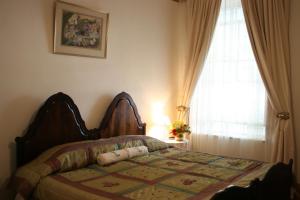 Ένα ή περισσότερα κρεβάτια σε δωμάτιο στο Thyme and Again Bed and Breakfast