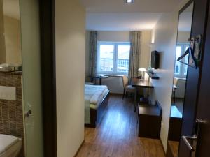 Postel nebo postele na pokoji v ubytování Hotel Evering