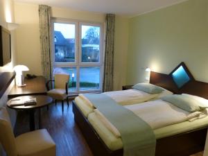 Postel nebo postele na pokoji v ubytování Hotel Evering + 29 fotografií