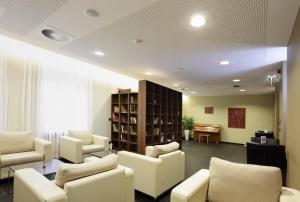 Posezení v ubytování Hotel-Résidence Am Klouschter