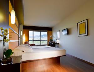 Posteľ alebo postele v izbe v ubytovaní Hotel Abades Nevada Palace