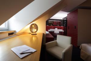 Posezení v ubytování Hotel-Résidence Am Klouschter