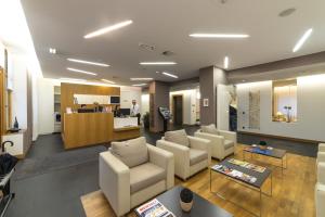 Posezení v ubytování Hotel-Résidence Am Klouschter