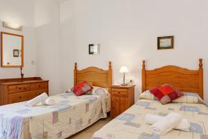 A bed or beds in a room at Macrina