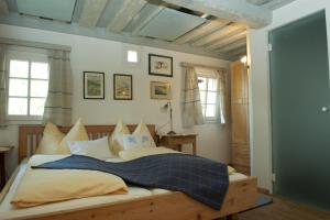 Giường trong phòng chung tại Wirtshaus Jagawirt