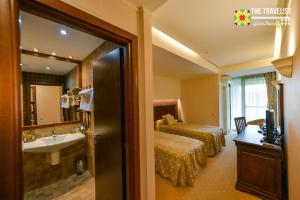 Ένα ή περισσότερα κρεβάτια σε δωμάτιο στο Apartament Alpin Poiana Brasov , etaj 8 +29 φωτογραφίες