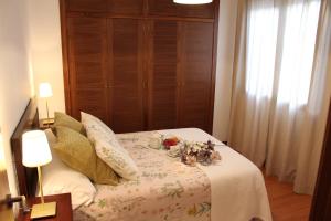 Postel nebo postele na pokoji v ubytování Apartamentos Balcón de la Vega