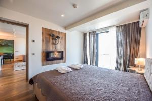 Łóżko lub łóżka w pokoju w obiekcie Palanga Sea View