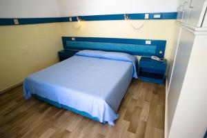 Posteľ alebo postele v izbe v ubytovaní Hotel Select