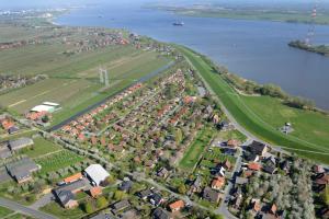 an aerial view of a city and a river at Ferienhaus Scout 42 im Feriendorf Altes Land in Hollern-Twielenfleth