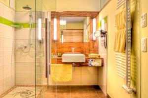 Koupelna v ubytování Revita Hotel Kocher