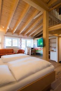 Postel nebo postele na pokoji v ubytování Hotel Bellevue