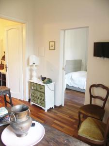 a room with a room with a bed and a table at Appartamento Real Taste of Tuscany Top in Florence