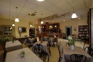 Restoranas ar kita vieta pavalgyti apgyvendinimo įstaigoje Hotel La Pergola