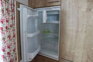 Kuchyň nebo kuchyňský kout v ubytování Apartment Nest