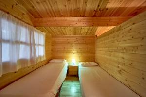 Postel nebo postele na pokoji v ubytování Camping Escana