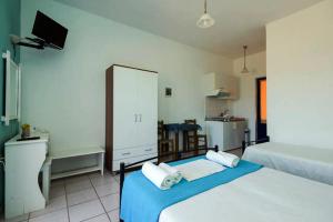 Postel nebo postele na pokoji v ubytování Contaratos Holiday Lettings
