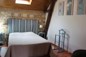 Postel nebo postele na pokoji v ubytování Logis de la Pichonnière