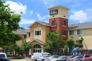 a building with a clock tower on top of it at Extended Stay America Suites - Denver - Aurora North in Aurora