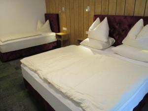 Posteľ alebo postele v izbe v ubytovaní Aparthotel Garni Schranz