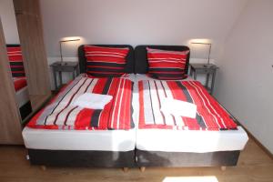 Ein Bett oder Betten in einem Zimmer der Unterkunft Schwaben Apartment