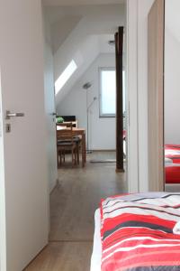 Ein Bett oder Betten in einem Zimmer der Unterkunft Schwaben Apartment