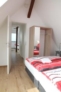 Ein Bett oder Betten in einem Zimmer der Unterkunft Schwaben Apartment