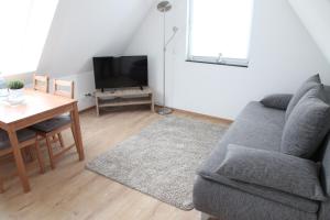 Ein Sitzbereich in der Unterkunft Schwaben Apartment