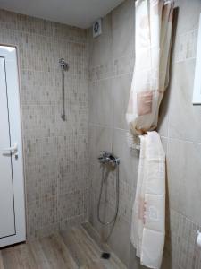 A bathroom at ROYAL apartment