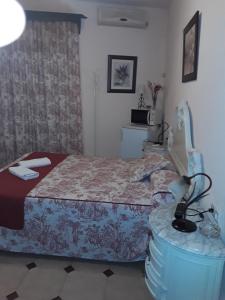 Ein Bett oder Betten in einem Zimmer der Unterkunft Hostal Rocio