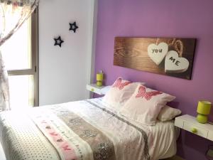 Łóżko lub łóżka w pokoju w obiekcie Alcalà Center A 5 minutos del paseo y playas